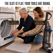 The flat hose entering the lint trap slot, labelled: flat hose enters the slot, seals to the vacuum you own