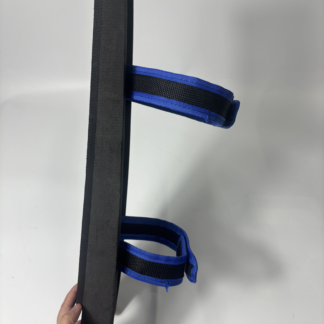 Close view of the PE shell, foam base and two adjustable wrap straps